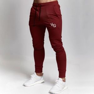 Men’s VQ Exodus red tapered bottoms size medium